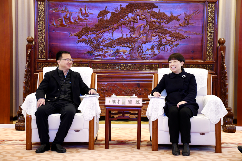王继才拜会丽江市委书记浦虹 (1)_副本.png